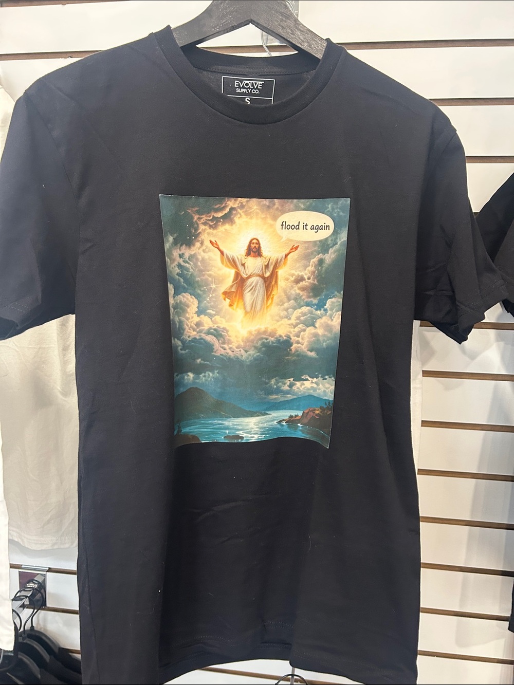 Next Level Apparel Black Short-Sleeve Tee with Multicolor Religious Graphic
